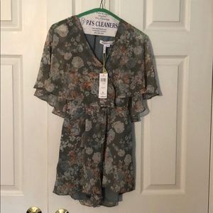 Brand new BCBG romper size XS